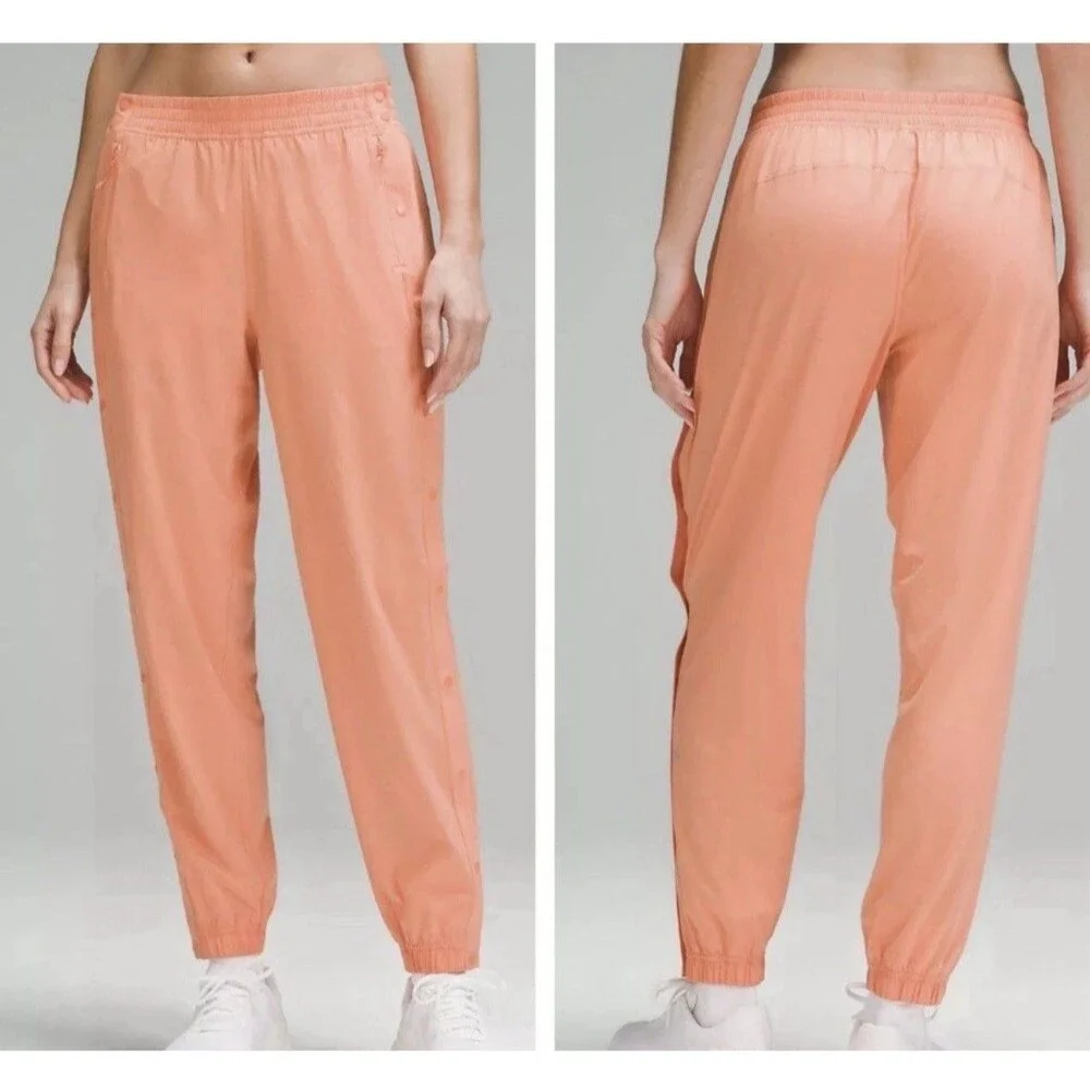 Lululemon Tear-Away Mid-Rise Track Pant Size 6 Coral Kiss Orange Swift LW5GAXS